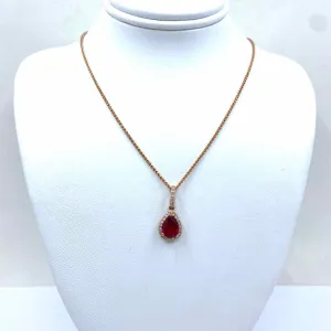 14KR ROSE GOLD PEAR RUBY & DIAMOND HALO NECKLACE