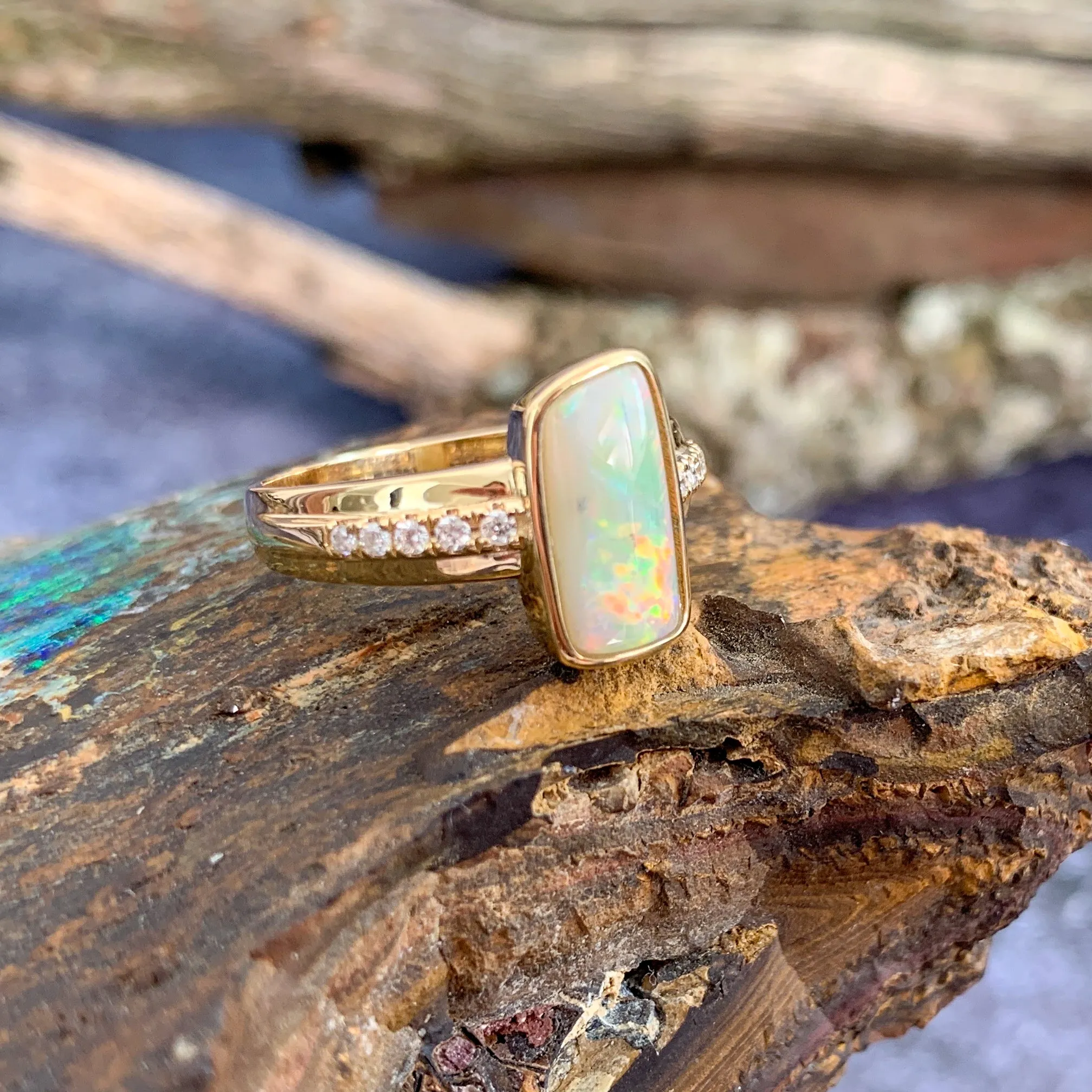 14kt Yellow Gold rectangular Fire Light Opal with diamonds ring