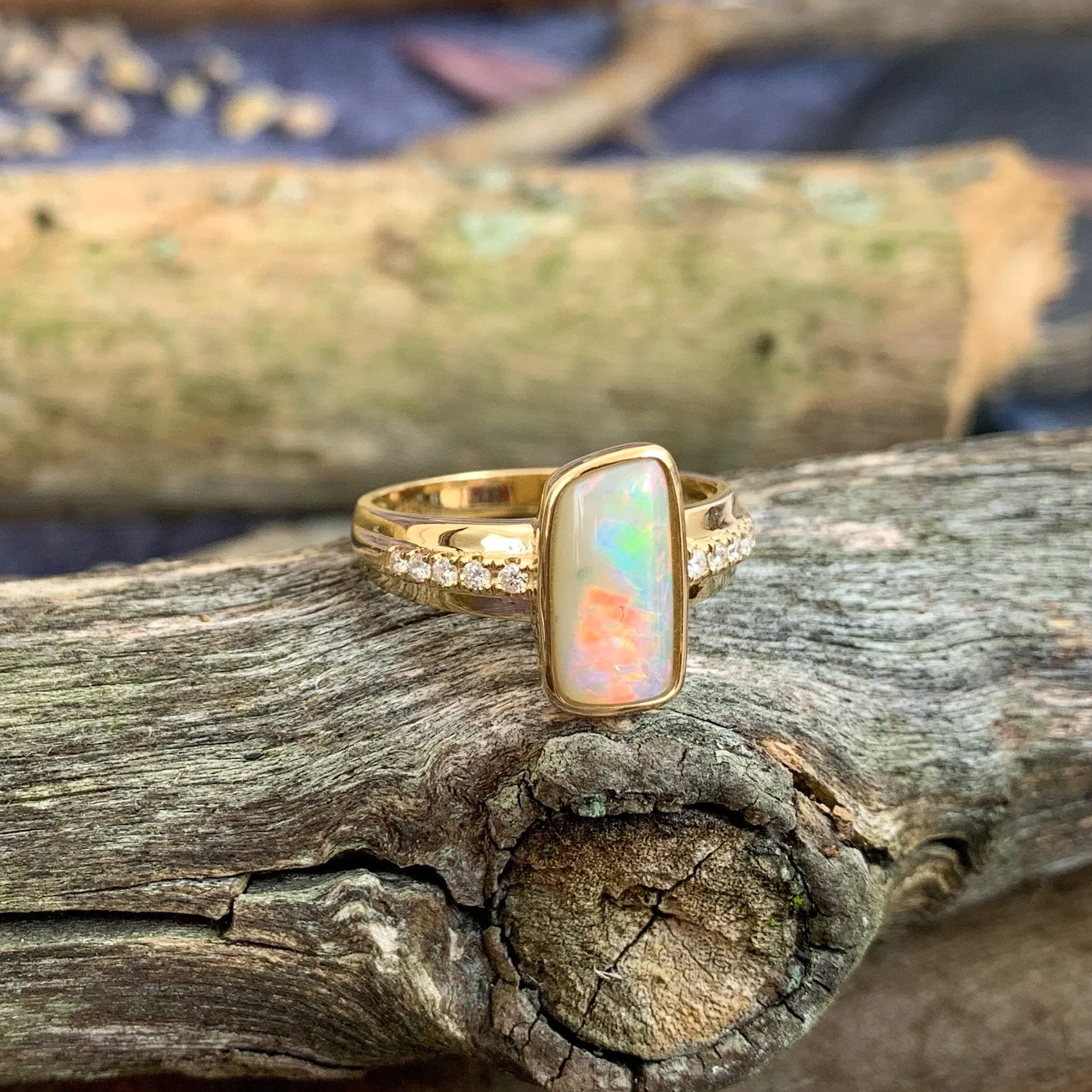 14kt Yellow Gold rectangular Fire Light Opal with diamonds ring