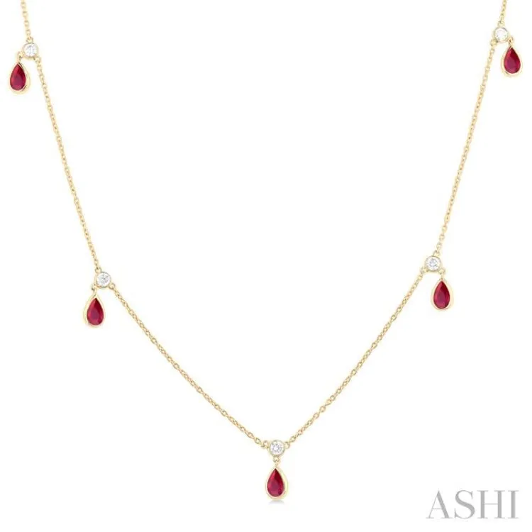 1/8 ctw Round Cut Diamonds and 5X3MM Pear Shape Ruby Precious Station Necklace in 10K Yellow Gold