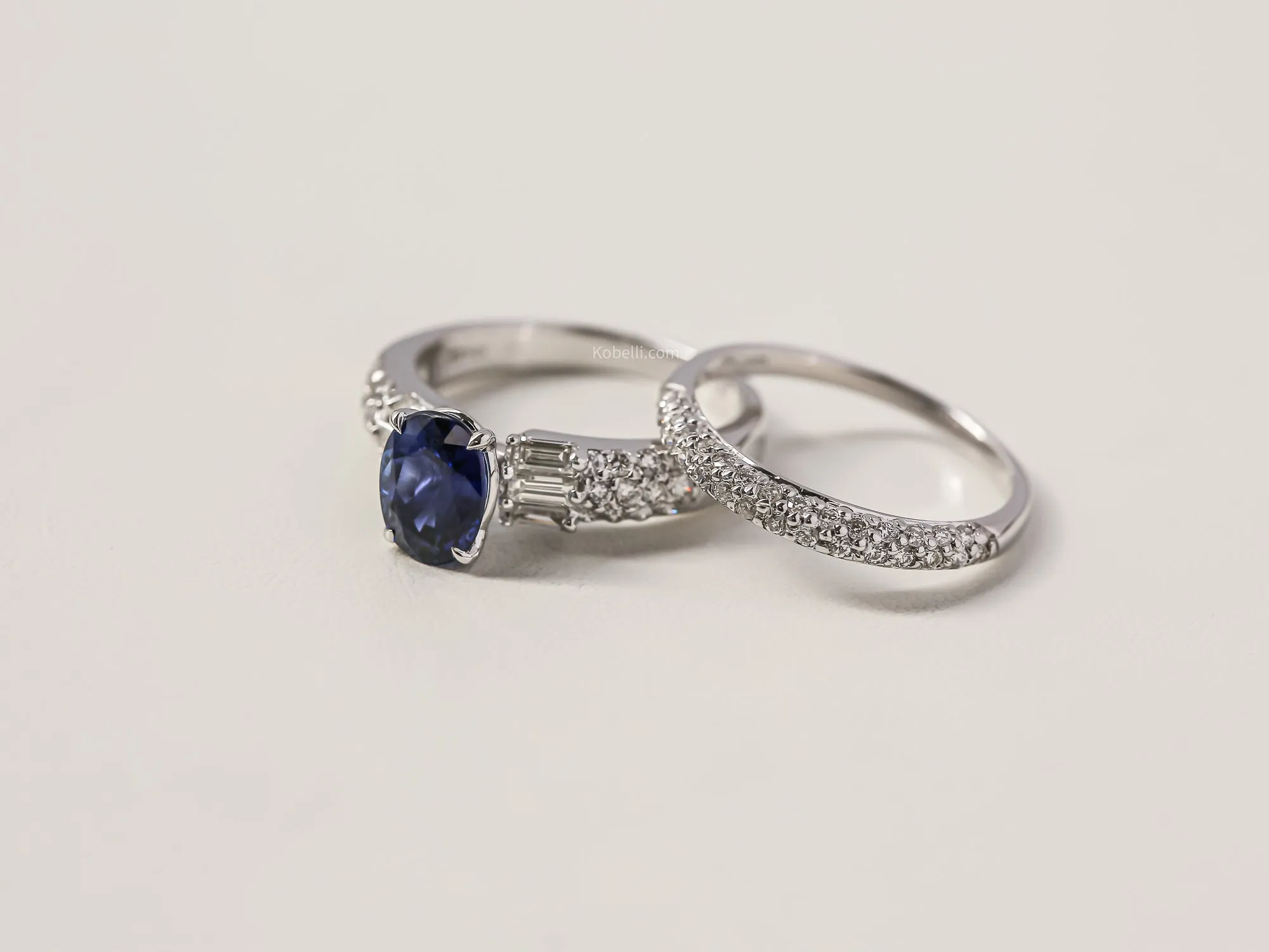 Oval Sapphire Diamond Lined Bridal Rings