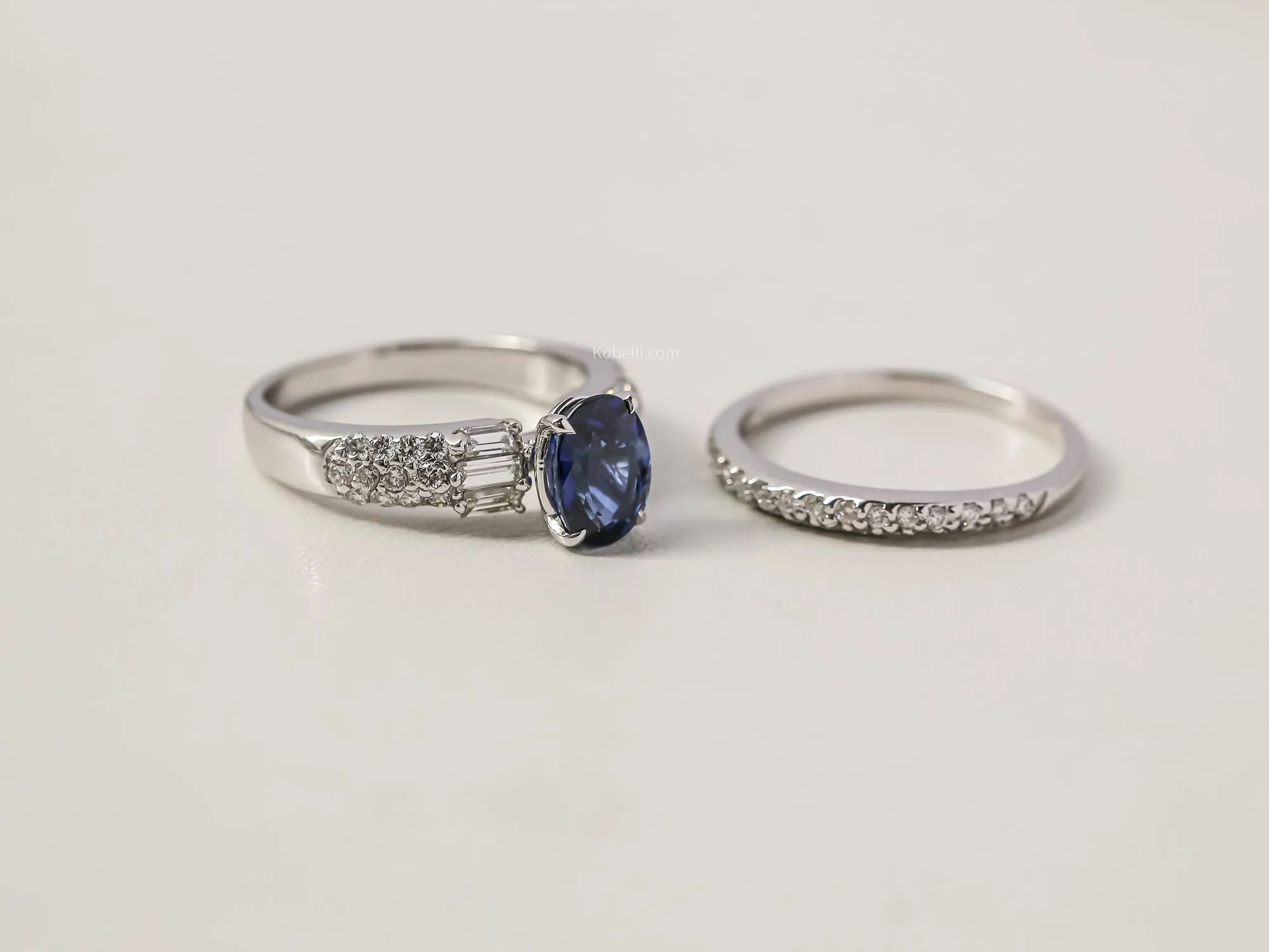 Oval Sapphire Diamond Lined Bridal Rings