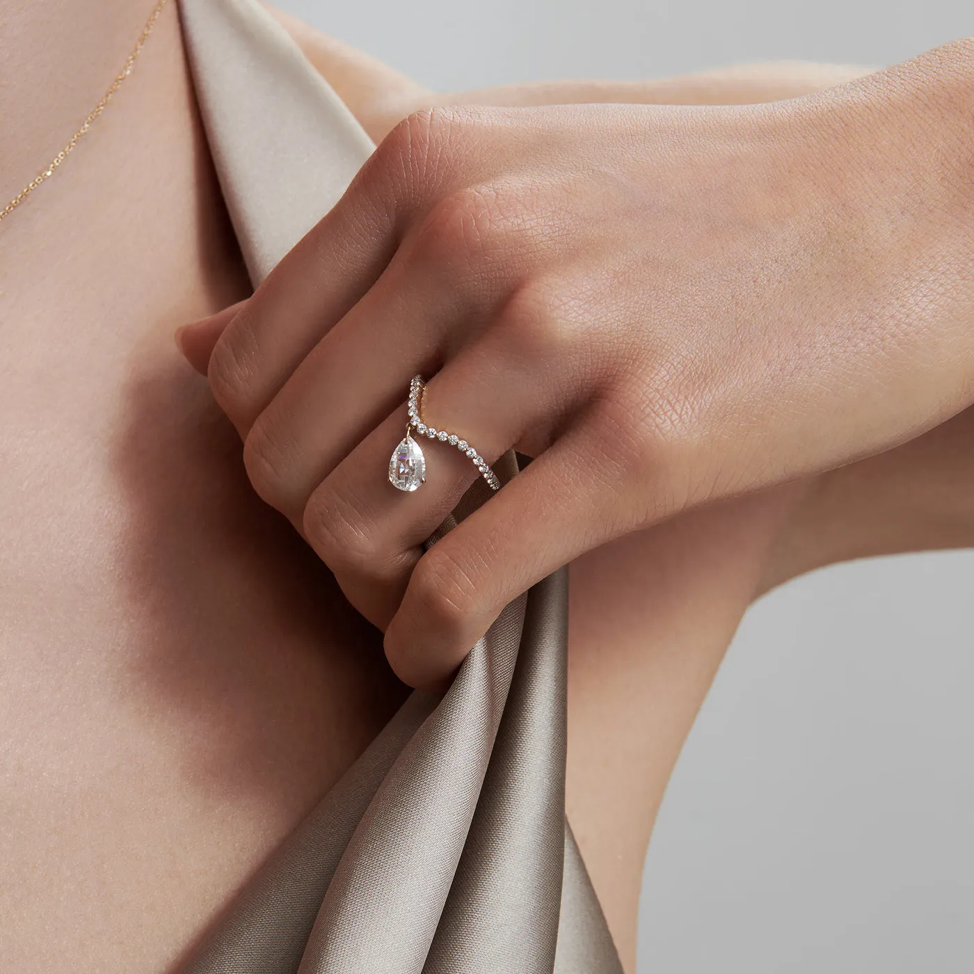 Tear drop curve ring