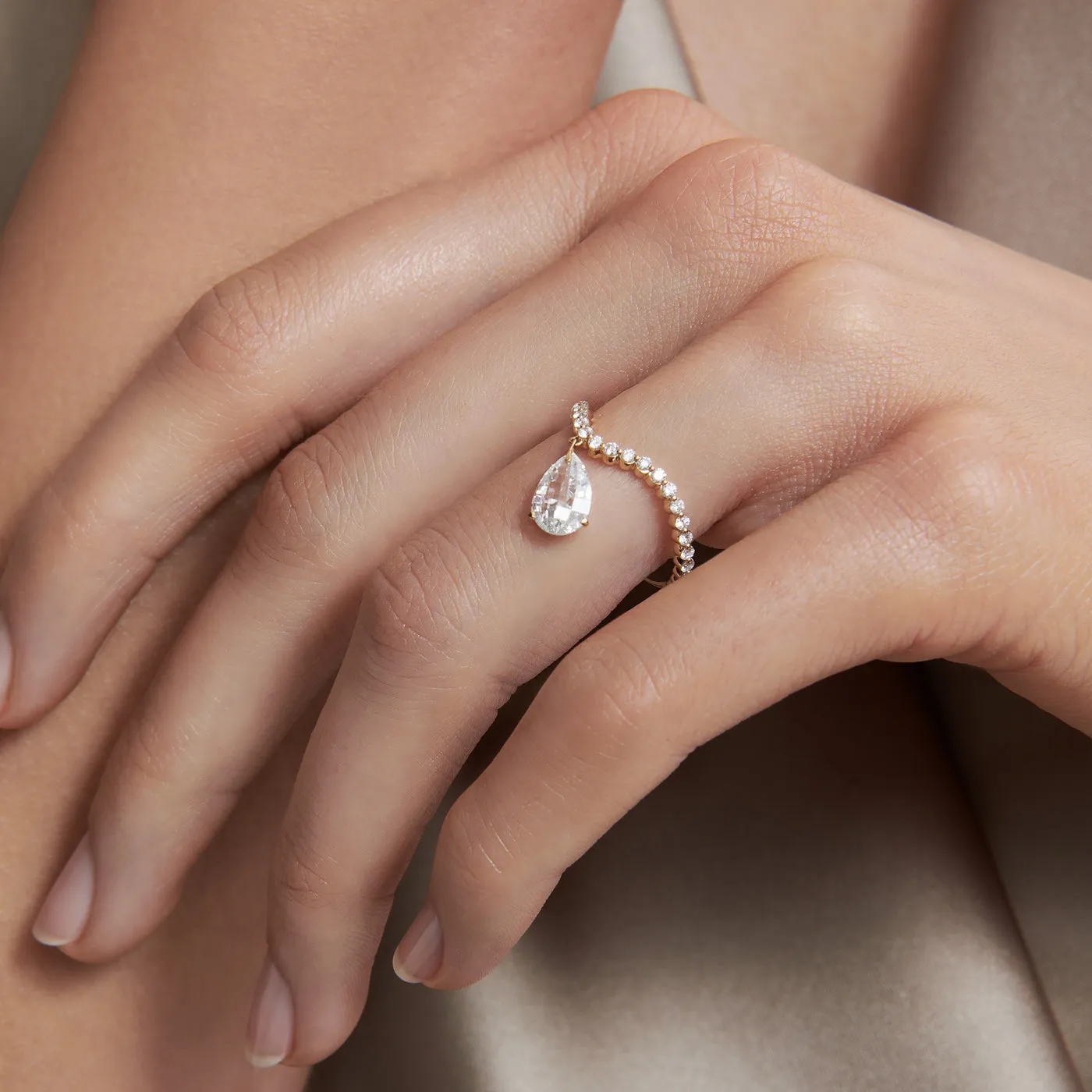 Tear drop curve ring